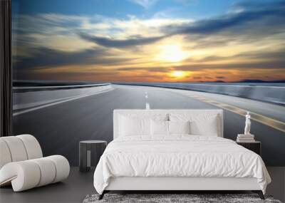 Motion-blurred highway in dusk clouds Wall mural