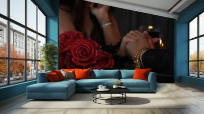 Two lovers on a date. Celebrating lovers. Valentine's day date. marriage proposal date. couple holding hands Wall mural