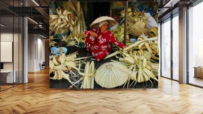 craftsmen when making Caping called Tanggui traditional Banjar hat, which is made of nipah leaves and is commonly used to avoid the sun and rain, Banjarmasin / South Kalimantan, May 8, 2019 Wall mural