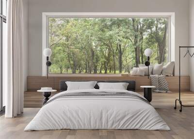 Side window seat 3d render.There are white room,wood seat,decorate with many pillow.There are big  windows look out to see nature view. Wall mural