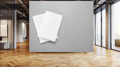 Blank portrait mock-up paper. brochure magazine isolated on gray, changeable background / white paper isolated on gray Wall mural