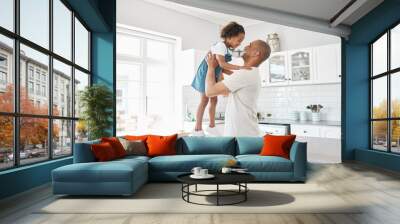 Shes daddys girl. Shot of a young father and daughter spending time together at home. Wall mural