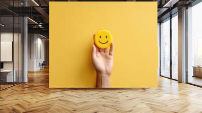 Hand holding paper cut smile face, positive thinking, mental health assessment , world mental health day concept, generative ai Wall mural