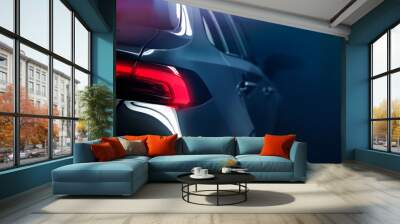 Back of the modern car on dark background with rear LED light close up (3D Illustration) Wall mural