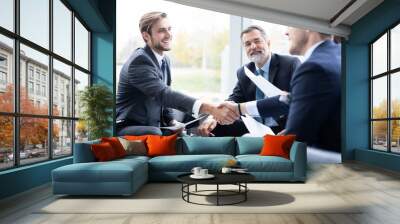 Business people shaking hands, finishing up a meeting. Handshake. Business concept. Wall mural