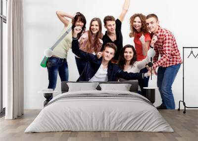 Casual group of excited friends isolated on white Wall mural