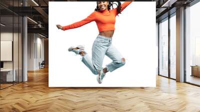 Excited happy pretty girl in casual jeans clothes high jump with raised hands and legs, on transparent background Wall mural