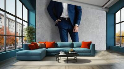 full length of handsome man wear blue suit isolated on grey background Wall mural