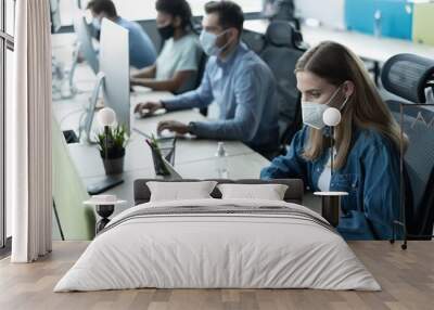 Group of business people wear protective face mask working in office with new normal lifestyle concept Wall mural