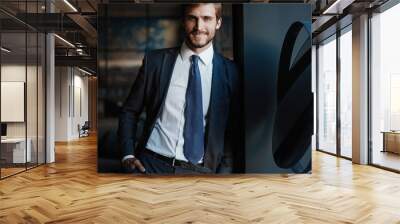 Handsome young businessman in office Wall mural