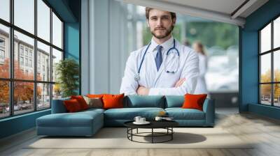 happy male medical doctor portrait in hospital. Wall mural