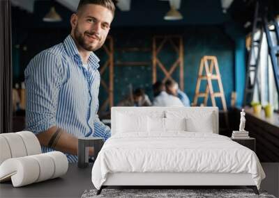 Man Working At Laptop In Contemporary Office Wall mural