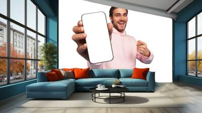 Mobile App Advertisement. Handsome Excited Man Showing Pointing At Empty Smartphone Screen Posing Over transparent background Wall mural