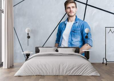 Perfect man. Portrait of happy fashionable handsome man in jeans shirt. Wall mural