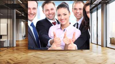 successful young business people showing thumbs up sign Wall mural