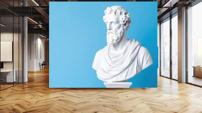 Greek philosopher bust, statue with copyspace on pastel blue background, philosophy and knowledge concept, wisdom Wall mural