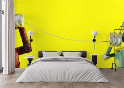 Retro two robots with tin can phones. 3d render Wall mural