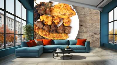 Mixed charcoal grilled platter chicken beef mutton goat meat shish kebab tawook middle east Arab wooden table Wall mural