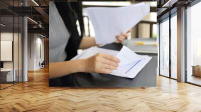 Office Woman hand Working on the Business Papers and tablet Wall mural