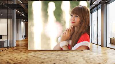 Portrait of beautiful Asian female santa in Christmas Wall mural