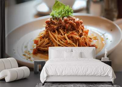 spaghetti Bolognese with minced beef and tomato sauce garnished with parmesan cheese and basil , Italian food Wall mural