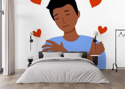 Self love concept vector illustration. Young man hugging himself with red heart shape around in flat design. Happiness. Wall mural