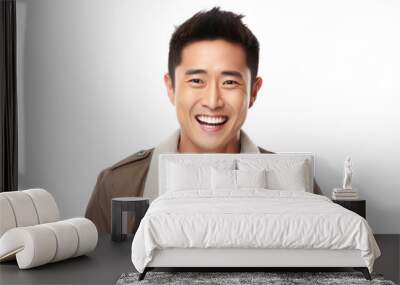 Cheerful, handsome, positive Chinese man with a genuine smile, isolated on a white background. Wall mural