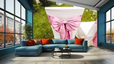 Wedding chair with pink bow Wall mural