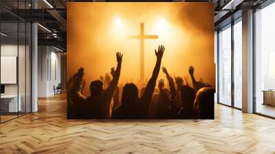 A group of Christians raised their hands and praised Jesus Christ. face of the cross Wall mural