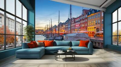 Nyhavn landmark buildings at night in Copenhagen city, Denmark Wall mural