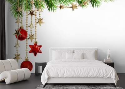 Christmas arrangement with green pine twigs and hanging red decorations Wall mural