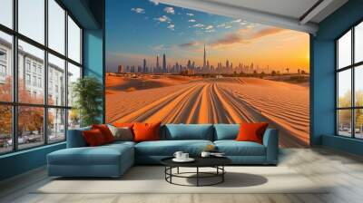 Dubai skyline on the horizon of a sand and dune landscape with tire tracks from a 4x4 vehicle during safari excursion. Blue sky at sunset Wall mural