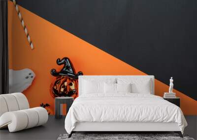 Table top view aerial image of decoration Happy Halloween day background concept.Flat lay accessories essential object to party the pumpkin & ghost on orange & black two tone paper.Space for design. Wall mural