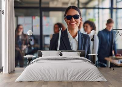 A blind Latin American businesswoman leading an important meeting of her company Wall mural