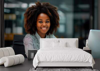 clerk beautiful african american woman sitting and working in an office  Wall mural