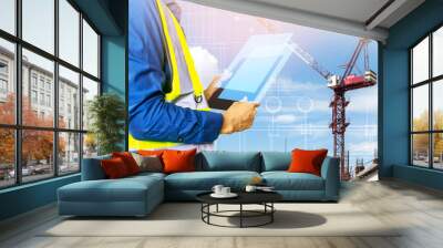 Engineers work on construction drawings and safety systems.,Building construction puts safety first. Wall mural