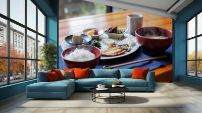 Japanese breakfast includes grilled fish, miso soup, tofu, rice, Japanese pickled vegetables, and Japanese green tea. Wall mural