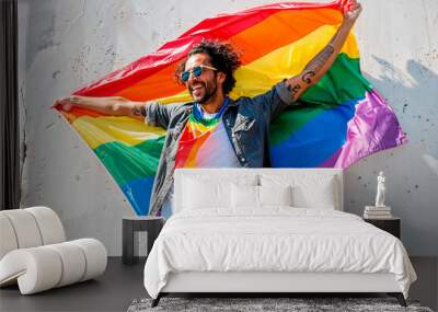 Joyful man celebrating with pride flag. Generative AI Wall mural