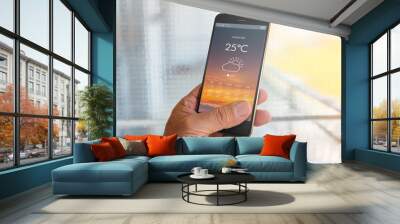 smart phone with weather forecast Wall mural