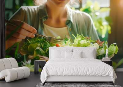 woman eating enjoying healthy food salad Wall mural