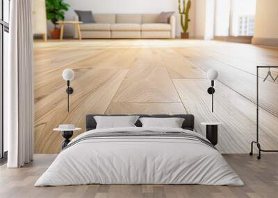 worker installing modern wood flooring in an empty room Wall mural