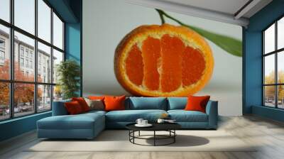 ripe and juicy tangerine (mandarin). fresh tangerine with leaf on white, closeup Wall mural