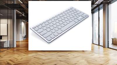 Modern computer keyboard isolated on white background with clipping path. material made from aluminum and plastic. It is an electronic device used for business and internet communication. Wall mural