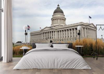 Utah State Capitol building south side. In 1888, the city donated the land, called Arsenal Hill, to the Utah Territory for the construction of a capitol building. Wall mural