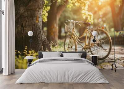 Vintage bicycle waiting near tree. with copy space. world bicycle day background concept Wall mural