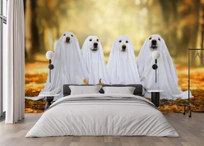 group of dogs in ghost costumes posing for Halloween outdoors in autumn Wall mural