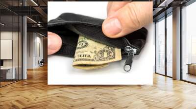 Dollar and coins in a shabby wallet. Poverty concept Wall mural