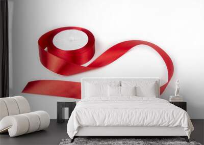 Roll of red ribbon on the white background Wall mural