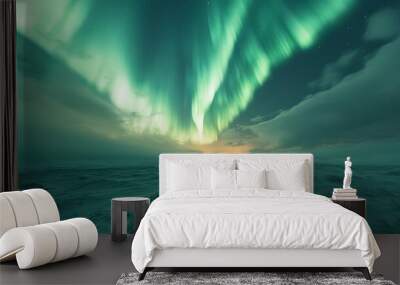 Aurora Borealis Displaying in the Night Sky Above a Snowy Landscape Wall mural