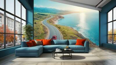 Red Car Driving on Winding Coastal Road with Ocean View Wall mural